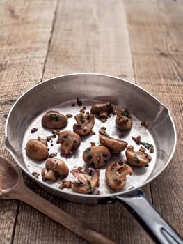 close up of rustic pan sauteed mushroom