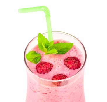 Raspberry dairy smoothie with fresh berries and sprig of mint with green cocktail stick  close up, isolated on white background