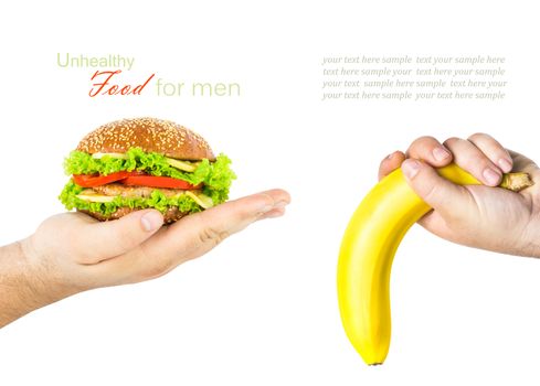 Concept. Unhealthy junk food for male sexual potency. A man's hand holding a burger, the other man's hand holding a banana like a big penis upside down that symbolizes lack of erection and impotence