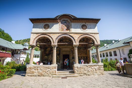 Cozia, Romania - Septemper 2, 2012: Tourists visiting Cozia monastery church  housing the tomb of Mircea the Elder, Romania