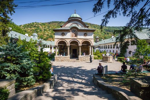 Cozia, Romania - Septemper 2, 2012: Tourists visiting Cozia monastery church  housing the tomb of Mircea the Elder, Romania