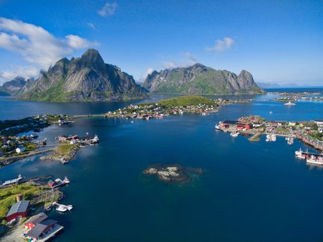 Breathtaking aerial view of fishing town Reine on Lofoten islands, popular tourist destination in Norway