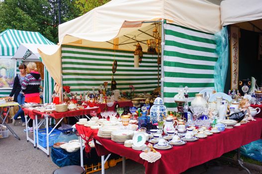 GDANSK, POLAND - JULY 29, 2015: Crockery and tableware for sale at a market