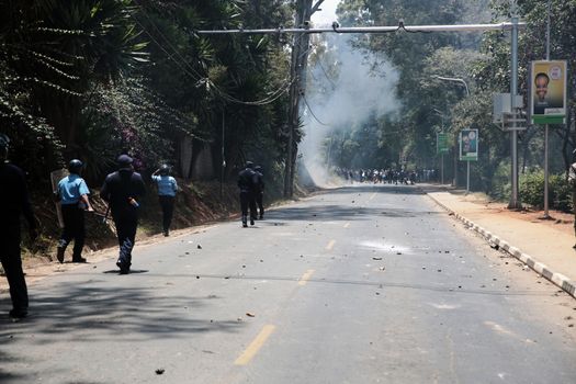 KENYA, Nairobi: Clashes erupt in Nairobi, Kenya on September 22, 2015 after police officials attempted to forcibly disperse university students protesting delayed government loans disbursement through Higher Education Learning Board (HELB).According to our contributor, the riot police had resorted to using tear gas canisters to break up the crowds, which had blocked Haile Selassie road.