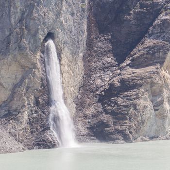 Waterfall at Lake Dix - Dam Grand Dixence - Switzerland, worlds tallest gravity dam