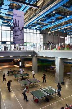 Paris, France - May 14, 2015: People visit Centre of Georges Pompidou on May 14, 2015 in Paris, France. The Centre of Georges Pompidou is one of the most famous museums of the modern art in the world.