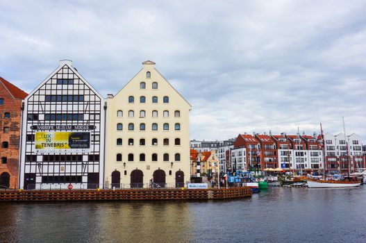 GDANSK, POLAND - JULY 29, 2015: Row of buildings by the Motlawa river in the city center