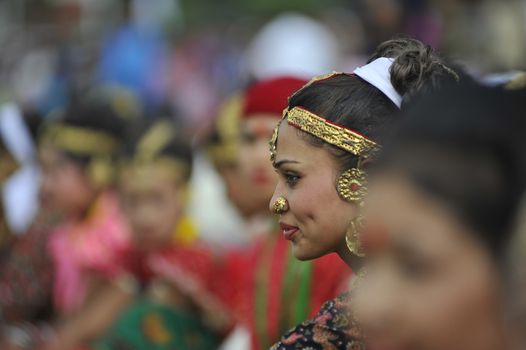 NEPAL, Kathmandu: A woman attends celebrations in Kathmandu, Nepal on September 21, 2015, one day after the government unveiled the country's first democratic constitution in a historic step. Out of the 598 members of the Constituent Assembly, 507 voted for the new constitution, 25 voted against, and 66 abstained in a vote on September 16, 2015. The event was marked with fireworks and festivities, but also with protests organized by parties of the Tharu and Madhesi ethnic communities.Photos taken by Newzulu contributor Narayan Maharjan show the Nepalese people donning traditional garb and celebrating with folk music and dancing.