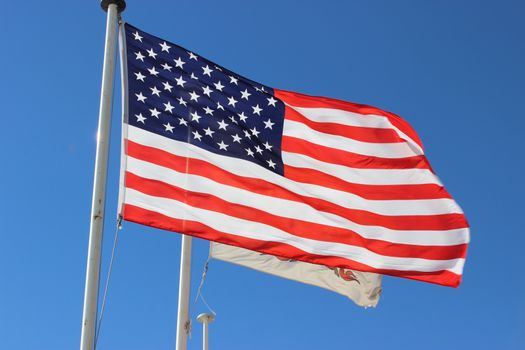 American Flag waving in Blue Sky. Nice, France