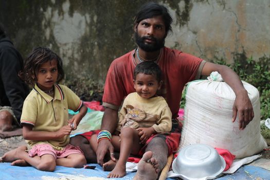 NEPAL: An itinerant Indian family from Bombay photographed in Lalitpur, Godwari in Nepal. Sanjay Singh Ghosle (3) does not go to school and begs on the streets with his father.Mahendra Singh Ghosle gave permission to take the pictures.A collection of pictures by Newzulu photographer Anish Gajurel capturing the hardship of life on the poverty line in Nepal.   