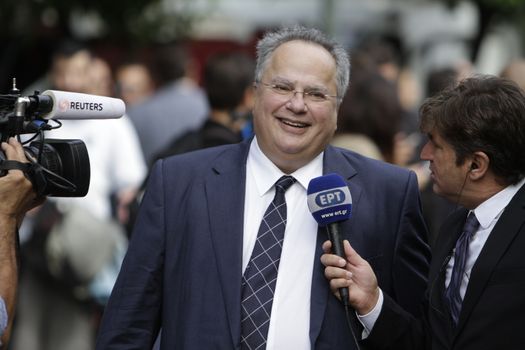 GREECE, Athens: Nikolaos Kotzias, the designated Minister of Foreign Affairs, gives an interview, arriving at the Presidential Mansion for the swearing-in ceremony in Athens, Greece on September 23, 2015. The ceremony took place at the Presidential Mansion, three days after the victory of SYRIZA (Coalition of the Radical Left) in the second Greek General Election in eight months.The implementation of the bailout, agreed after months of bitter negotiations, will be the government's overwhelming task.