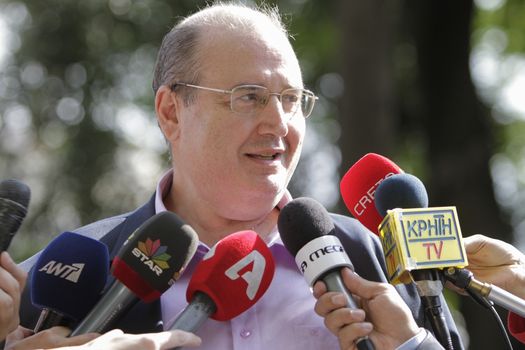 GREECE, Athens: Nikos Filis, the Minister of Environment and Energy, gives an interview at the Presidential Mansion after the swearing-in ceremony in Athens, Greece on September 23, 2015. The ceremony took place at the Presidential Mansion, three days after the victory of SYRIZA (Coalition of the Radical Left) in the second Greek General Election in eight months.The implementation of the bailout, agreed after months of bitter negotiations, will be the government's overwhelming task.