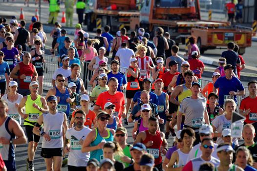 AUSTRALIA, Sydney: Participants compete in the Sydney Running Festival on September 20, 2015. Around 30,000 participants took part in the 15th Sydney Running Festival which incorporates a 42km marathon, a half marathon, a 9km bridge run as well as a 3.5km family fun run