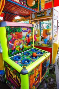 USTRONIE MORSKIE, POLAND - JULY 20, 2015: Colorful hammer game at a fair 