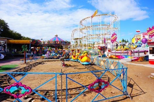 USTRONIE MORSKIE, POLAND - JULY 20, 2015: Duck train attraction at a fair