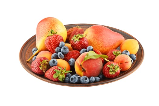 Mellow fresh summer fruits and berries mix in ceramic plate isolated on white, strawberries, blueberries, apricots, peach and pear