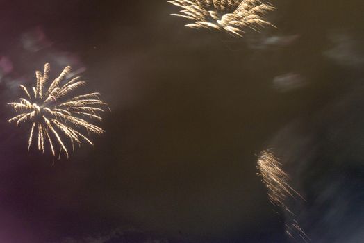 Fireworks in the sky at night.