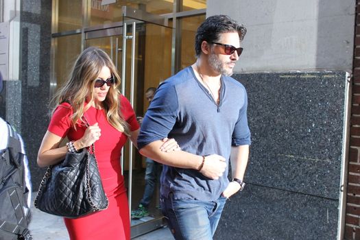 USA, New York: Addicted to cake, vivacious Modern Family superstar Sofia Vergara hurries to her car with Hollywood-hunk fiancee Joe Manganiello after visiting Ron Ben-Israel Cakes in Midtown Manhattan on September 23, 2015. Bakery staff confirmed that the super couple was at the shop; but when asked if the pair had decided to buy their wedding cake from the bakery, one employee revealed that it was all up in the air.
