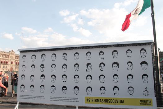 MEXICO, Mexico City : Fathers and relatives of the 43 missing students from Ayotzinapa arrive at Zocalo Square in Mexico City on September 23, 2015. Parents of 43 Mexican students who disappeared last year began a 43-hour hunger strike on Wednesday, a day before meeting with President Enrique Pena Nieto ahead of the case's anniversary.