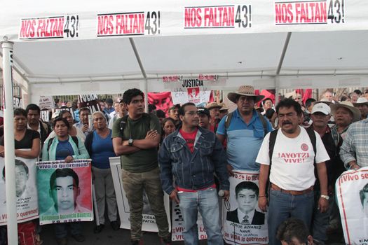MEXICO, Mexico City : Fathers and relatives of the 43 missing students from Ayotzinapa arrive at Zocalo Square in Mexico City on September 23, 2015. Parents of 43 Mexican students who disappeared last year began a 43-hour hunger strike on Wednesday, a day before meeting with President Enrique Pena Nieto ahead of the case's anniversary.