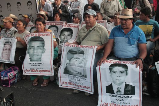 MEXICO, Mexico City : Fathers and relatives of the 43 missing students from Ayotzinapa arrive at Zocalo Square in Mexico City on September 23, 2015. Parents of 43 Mexican students who disappeared last year began a 43-hour hunger strike on Wednesday, a day before meeting with President Enrique Pena Nieto ahead of the case's anniversary.