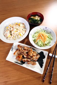 Japanese menu with chicken, rice and vegetables