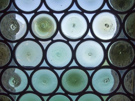 MONTREUX, SWITZERLAND -JUNE 26: Glass window of the 13th century Chillon Castle on June 26, 2011 in Montreux, Switzerland. The castle is an island castle located on the shore of Lake Geneva.