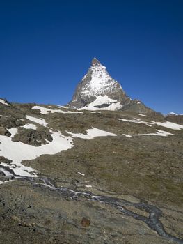 Matterhorn mountain in the Pennine Alps on the border between Switzerland and Italy. Its summit is 4,478 metres (14,692 ft) high, making it one of the highest peaks in the Alps
