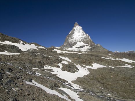 Matterhorn mountain in the Pennine Alps on the border between Switzerland and Italy. Its summit is 4,478 metres (14,692 ft) high, making it one of the highest peaks in the Alps