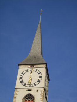 Clock tower of St.Martin Church in Chur(Coire) city on the right shore of the Rhine-River and is known as the oldest town of Switzerland.