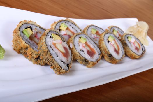 sushi on white rectangular plate