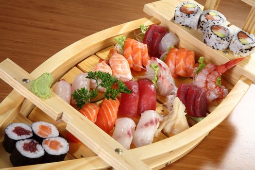 sushi and sashimi platter of wood