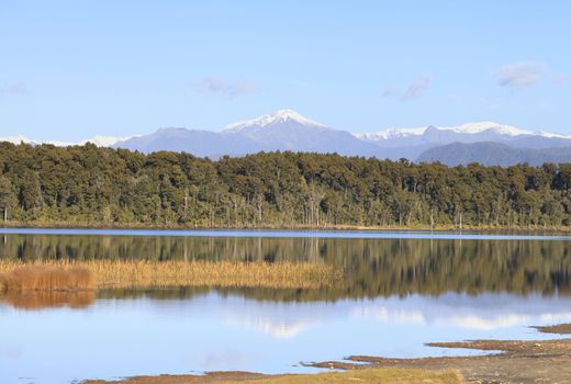 Lake Mahinapua, a shallow lake on the West Coast of The South Island, New Zealand. It is roughly 10km south of Hokitika and near the small town of Ruatapu.