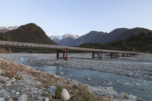 Bridge across Waiho river, Franz Josef (Ka Roimata o Hinehukatere in Maori), West Coast region, South Island, New Zealand.