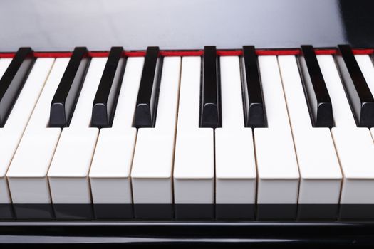 Front view Close up of piano keys. 