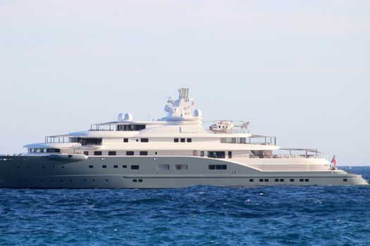 Luxury yacht with Helicopter on the Back Side View in Monaco