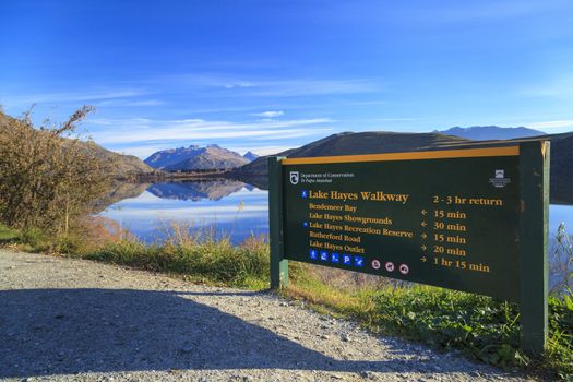 Lake Hayes and Tourism information display, Otago region, South Island, New Zealand.