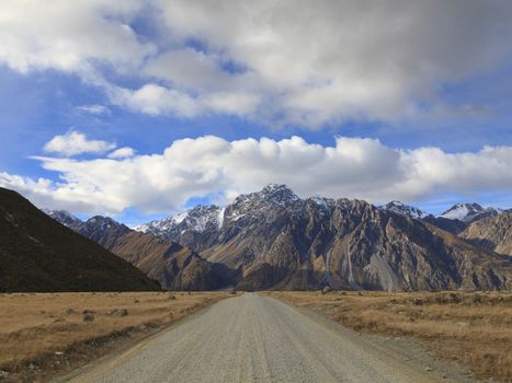 Gravel road leading to Tasman Valley in Aoraki Mount Cook National Park, Canterbury region, South Island, New Zealand.