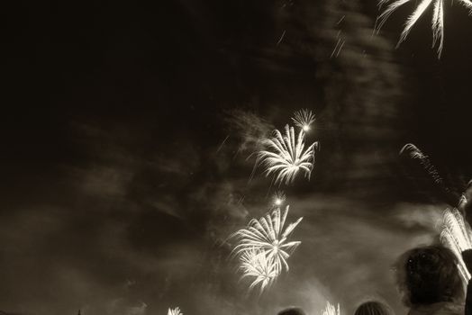 Fireworks in the sky at night.