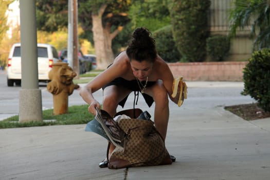 Alicia Arden
star of "Hoarding: Buried Alive," has both a purse malfunction and a wardrobe malfunction while leaving yoga class, Woodland Hills, CA 09-23-15