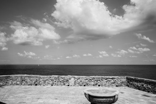 The beautiful land on the sea in Cefalu allows visitors to linger and admire the sea.