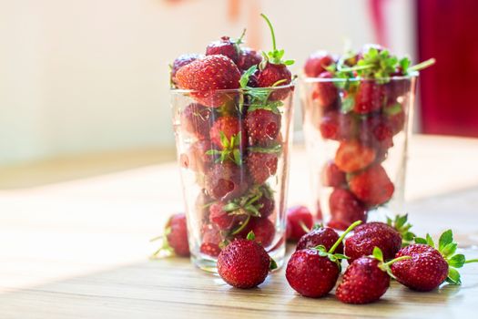 Fresh ripe strawberry in a glass