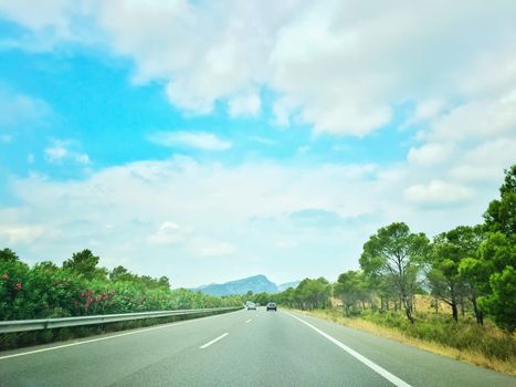 Highway leading towards the mountains. Catalonia, Spain.