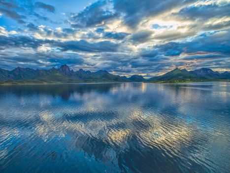 Scenic view of reflecting clouds on Vesteralen islands with their dramatic mountain peaks