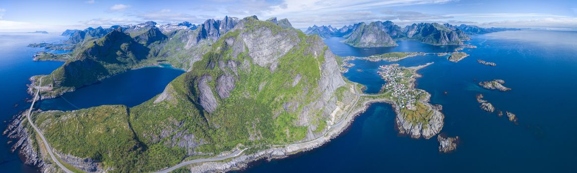 Panoramic aerial view of Reine and scenic road on Lofoten islands in Norway