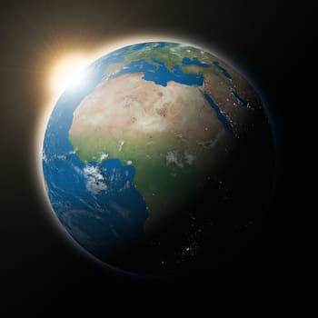 Sun over Africa on blue planet Earth isolated on black background. Highly detailed planet surface. Elements of this image furnished by NASA.