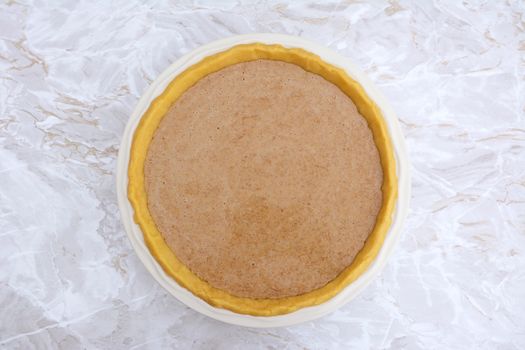Homemade pumpkin pie ready to be baked