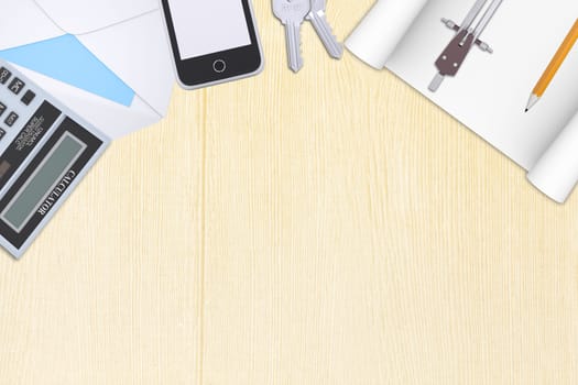 Smartphone with calculator on wooden table with keys