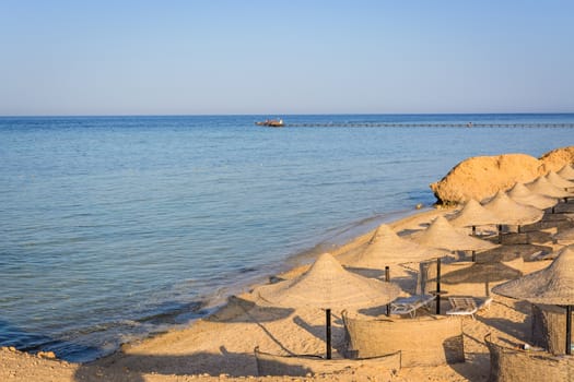 Egyptian parasols on the beach of Red Sea