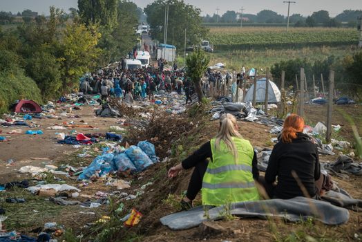 SERBIA, Berkasovo: Middle Eastern refugees leave a makeshift camp in the Serbian town of Berkasovo, on the border with Croatia on September 24, 2015. 
